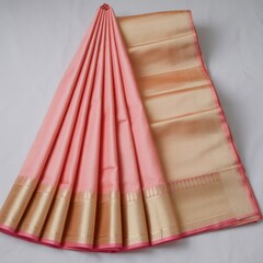Elegant peach silk saree with intricate golden border and rich weave detail