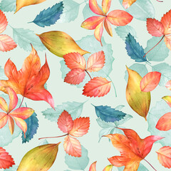 Seamless pattern with watercolor hand drawn colorful leaves on bright blue background