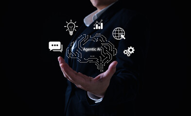 Agentic AI concept as businesswoman presents virtual brain interface with icons, representing autonomous artificial intelligence, decision-making systems, and future technology for smart automation.