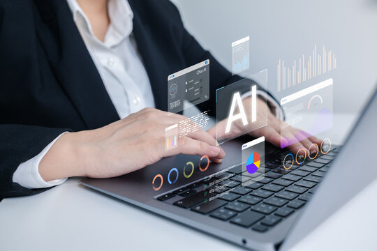 AI-powered analytics concept as businesswoman uses laptop with virtual dashboards and data visualizations, representing artificial intelligence, data processing, and smart business insights.