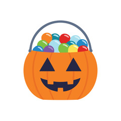 Orange jackolantern bucket filled with colorful candies and treats halloween pumpkin