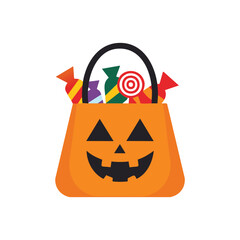 Orange pumpkin bag filled with colorful candies halloween candy