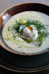 Traditional Czech dill soup Kulajda — a creamy soup made with mushrooms, potatoes, poached egg, and fresh dill. A comforting and flavorful dish from Czech cuisine, served warm and perfect for autumn.