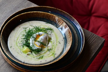 Traditional Czech dill soup Kulajda — a creamy soup made with mushrooms, potatoes, poached egg, and fresh dill. A comforting and flavorful dish from Czech cuisine, served warm and perfect for autumn.