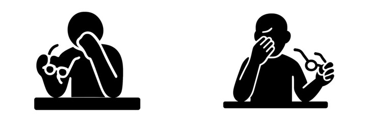 Black glyph icon of a tired person with eye strain taking off glasses and rubbing eyes from overwork or fatigue