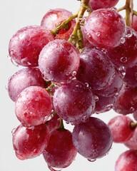 Fototapeta premium Close-up of a bunch of wet, red grapes