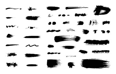 Collection of Black Brush Strokes and Splatters on White Background