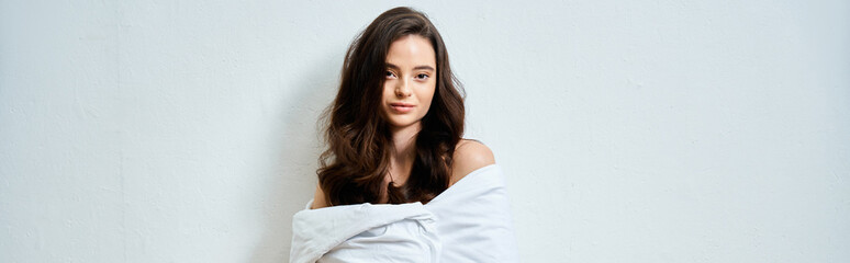 Brunette woman relaxing in cozy bedroom, embracing serene moment of tranquility