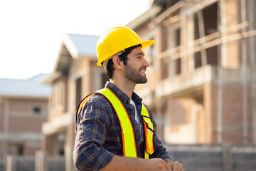 Portrait Hispanic male engineer : Architect, contractor and architecture standing in house building under construction site. Engineering in safety harthat helmet, Professional engineering teamwork