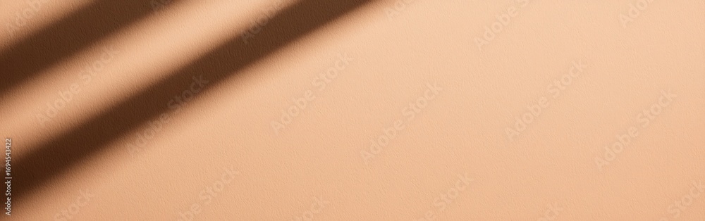 Poster a minimalist image featuring a smooth, peach-colored surface with soft shadows adding depth and text