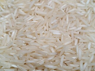 Close up shot pile of raw white rice.