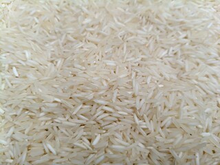 Close up shot pile of raw white rice.