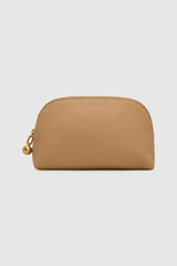 Stylish beige leather cosmetic bag with golden charm on neutral background