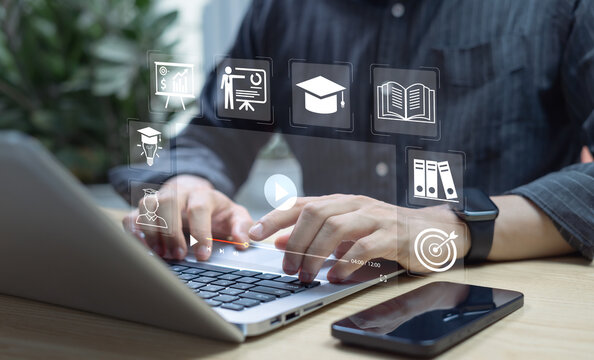 E-learning and online education concept with businessman joining internet lessons and webinars on digital screen, showcasing education technology, virtual learning, and professional knowledge growth.