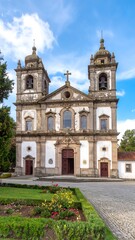Fototapeta premium Historic church facade, gardens