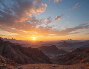 Beautiful, tranquil sunrise over mountain landscape. orange sun rises in sky with scenic clouds, creating majestic and peaceful view