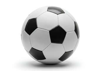 Fototapeta premium A soccer ball, with black and white panels, sits centered against a plain white background.