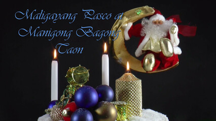 Warm Wishes for Christmas Joy  A festive card with candles, baubles, and Santa Claus in the language Philippines   © Joop Hoek
