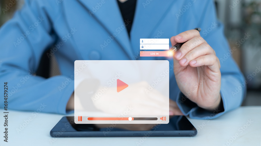 Aufkleber business using login access with video streaming player interface on digital tablet, concept of onli