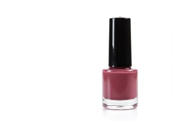 A bottle of mauve-toned nail polish, its smooth surface reflecting light against a pure white background.