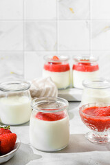 homemade yogurt in jars with strawberries