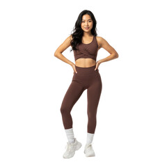 Fototapeta premium Beautiful Asian Woman Posing in Brown Activewear Set on a Black Background Studio Shot