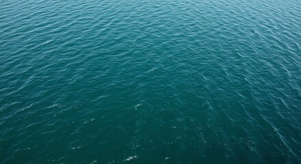 Obraz premium Blue ocean surface with gentle ripples