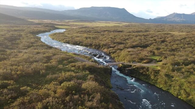 Wide Aerial View of Br&uacute;arfoss River  Bridge Tourists in Iceland