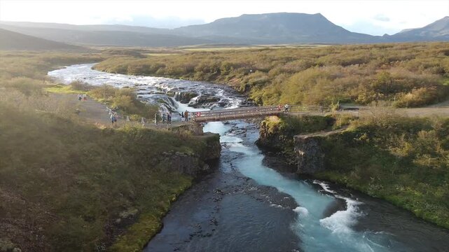 Wide Aerial View of Br&uacute;arfoss Bridge Tourists in Iceland