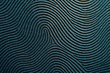 Close-up of abstract fingerprint pattern with textured surface and light highlights on dark background for biometric identity concept illustration. Ai generative