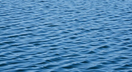Blue water surface with small ripples