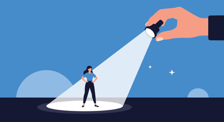 Woman standing confident in spotlight being highlighted by giant hand holding flashlight