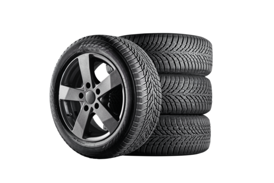 Car tires with a great profile in the car repair shop. Set of summer or winter tyres in front of white fond. On transparent PNG background.