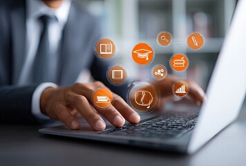 Businessperson using a laptop with educational icons overlaid