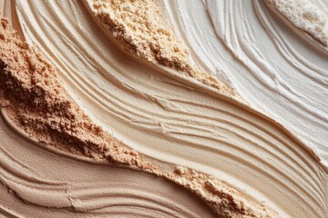 Abstract swirls of three shades of beige and light tan powder makeup