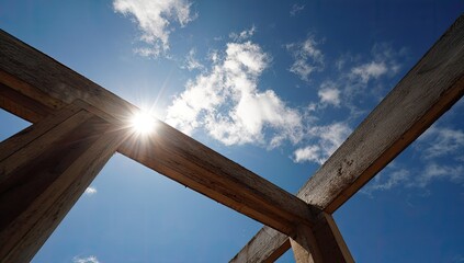 Wooden beams against a bright sky (1)