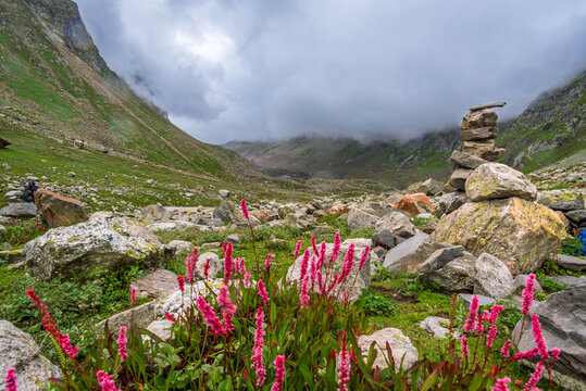 This is the view from Hampta pass trek's trail near summit. It is located at a height of 4270m surrounded by peaks of Dhauladhar range near Manali, India.