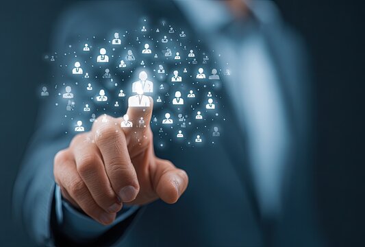 Businessman interacting with a digital display of numerous people icons