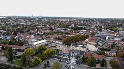 Obraz premium Drone view of Párkány city on a cloudy spring day 