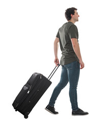 Side view guy traveler carrying his rolling suitcase, walking isolated on transparent background....