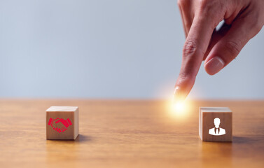 Cubes with handshake symbol. Business agreement between different parties. Business deal,...