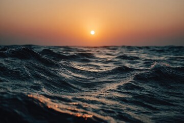 Obraz premium Sunset over a restless sea