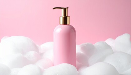 Pink pump bottle surrounded by white foam against a soft pink background, evoking freshness, skincare, and minimal beauty aesthetics.