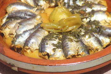 Traditional Moroccan Tajine with sardines and vegetables
