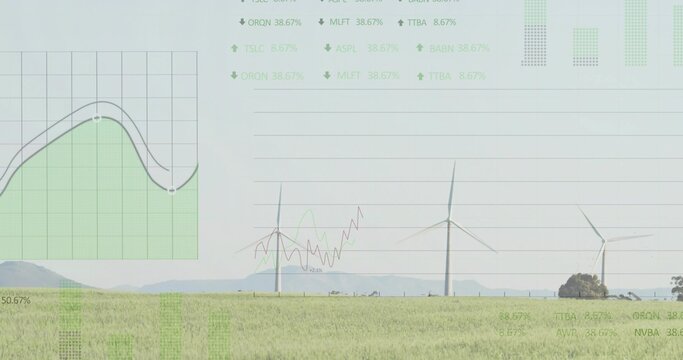 Fototapeta Wind farm featuring three rotating turbines in field by hills, with translucent data overlays