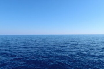 Wide expanse of calm ocean, clear sky