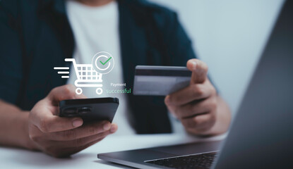 Person making online payment with smartphone and credit card showing digital shopping cart icon and payment successful message representing ecommerce financial transaction and secure mobile banking