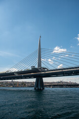 Obraz premium The various architectural views and perspectives of the Golden Horn Metro Bridge, located in the touristy Eminönü Golden Horn district of Istanbul, its cable-supported design and engineering structure
