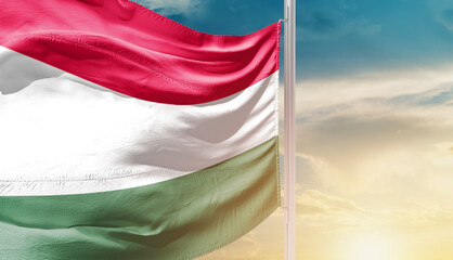 Hungary national flag waving in an amazing sunlight. National flag wavering on mast.