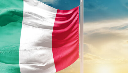 Italy national flag waving in an amazing sunlight. National flag wavering on mast.